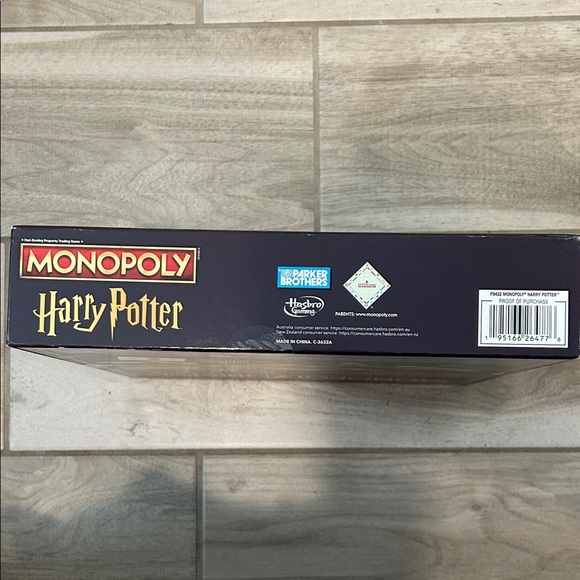 Hasbro Harry Potter Monopoly with Red and Gold Accents - Picture 8 of 8